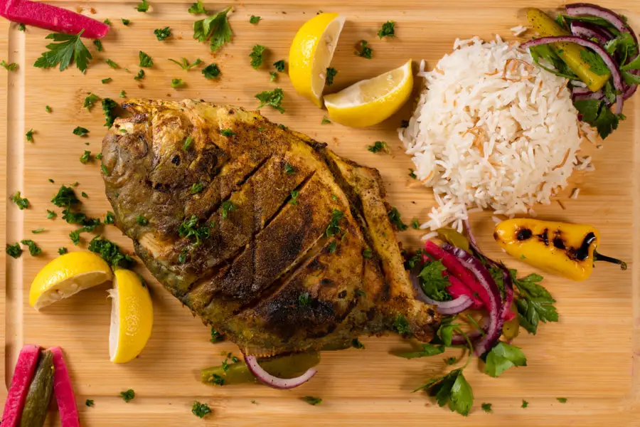 Zubaidi pomfret wholesale fish supplier Riyadh bulk fresh frozen whole silver pomfret Al Kharj KSA